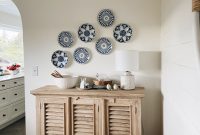 Dining Room Makeover: Rearranging Furniture and Hanging Decorative Plates