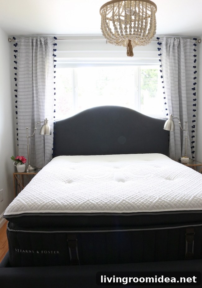 Small Coastal Cottage Bedroom with beaded chandelier, striped curtains, Stearns & Foster mattres