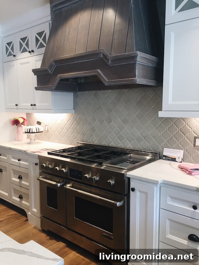 Kitchen - Gray Wood Range Hood - Arabesque Tile Backsplash