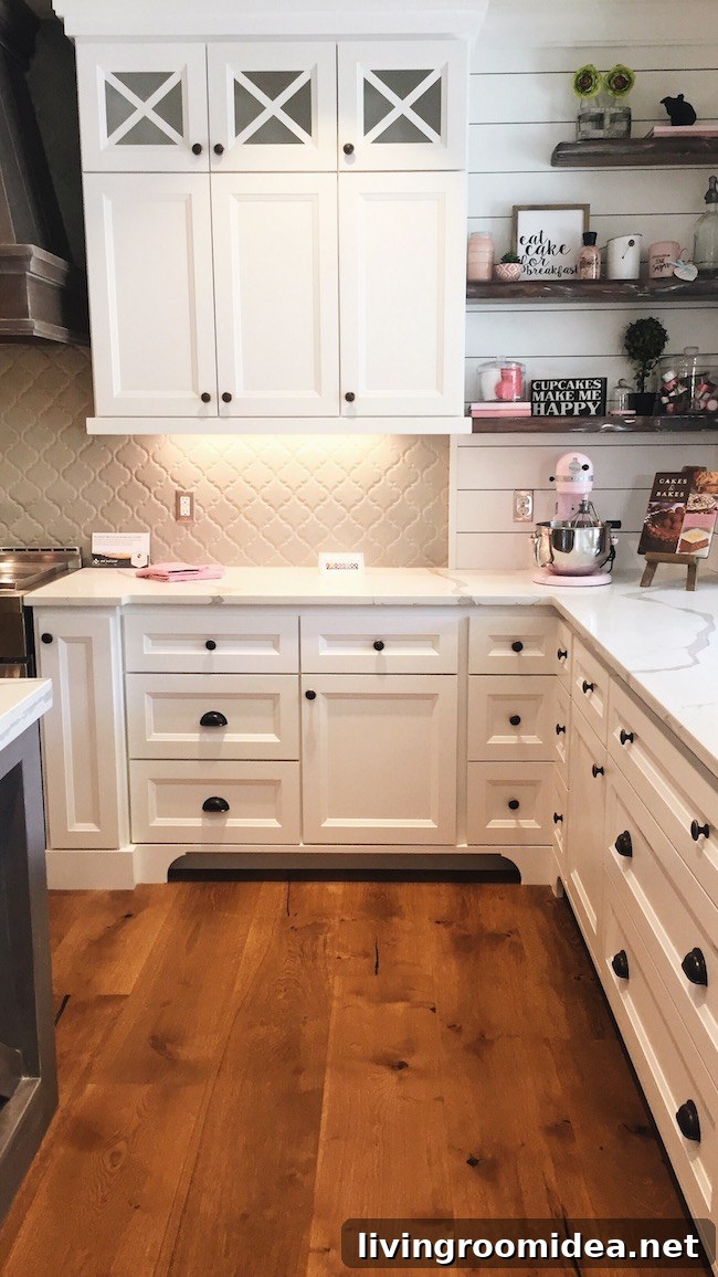 Inside a Modern Farmhouse: Street of Dreams Home Tour 12 Kitchen White Cabinetry - Black Hardware - Wood Floors - Shiplap