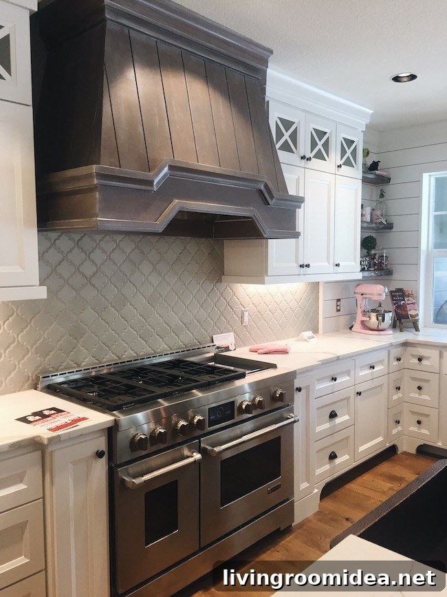 Inside a Modern Farmhouse: Street of Dreams Home Tour 14 White Kitchen - Gray Backsplash