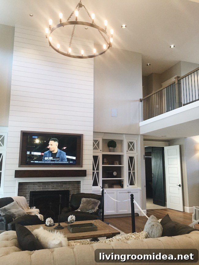 Inside a Modern Farmhouse: Street of Dreams Home Tour 24 Two Story Family Room and Fireplace- Street of Dreams
