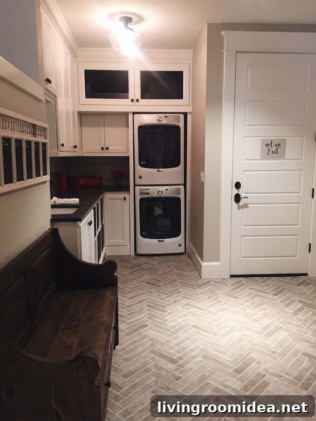 Inside a Modern Farmhouse: Street of Dreams Home Tour 28 Herringbone Tile Mudroom - Street of Dreams