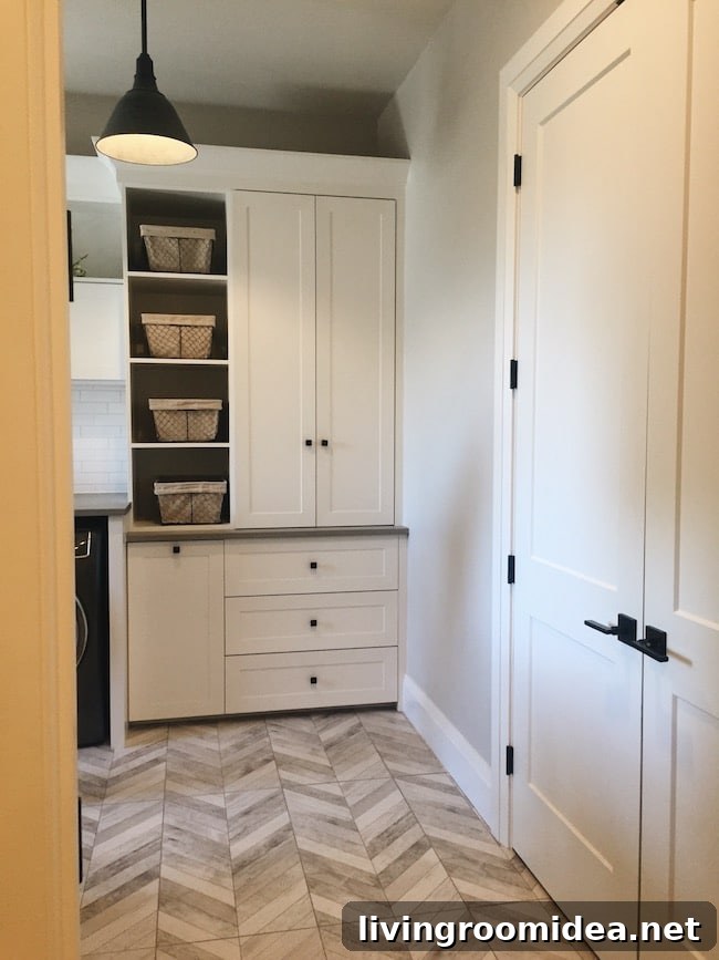Inside a Modern Farmhouse: Street of Dreams Home Tour 30 Street of Dreams Black and White Mudroom - Herringbone Floor