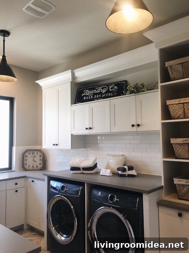 Black Front Loader Appliances Laundry Room White Cabinets Black Knobs