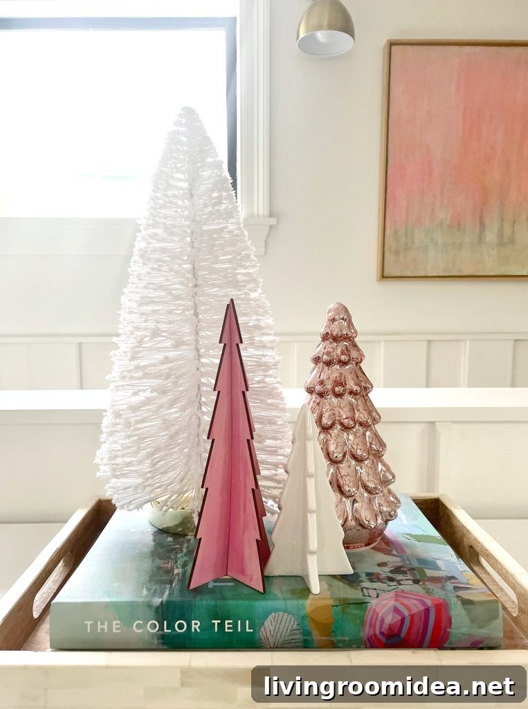 Assortment of decorative Christmas tabletop trees in pink and white