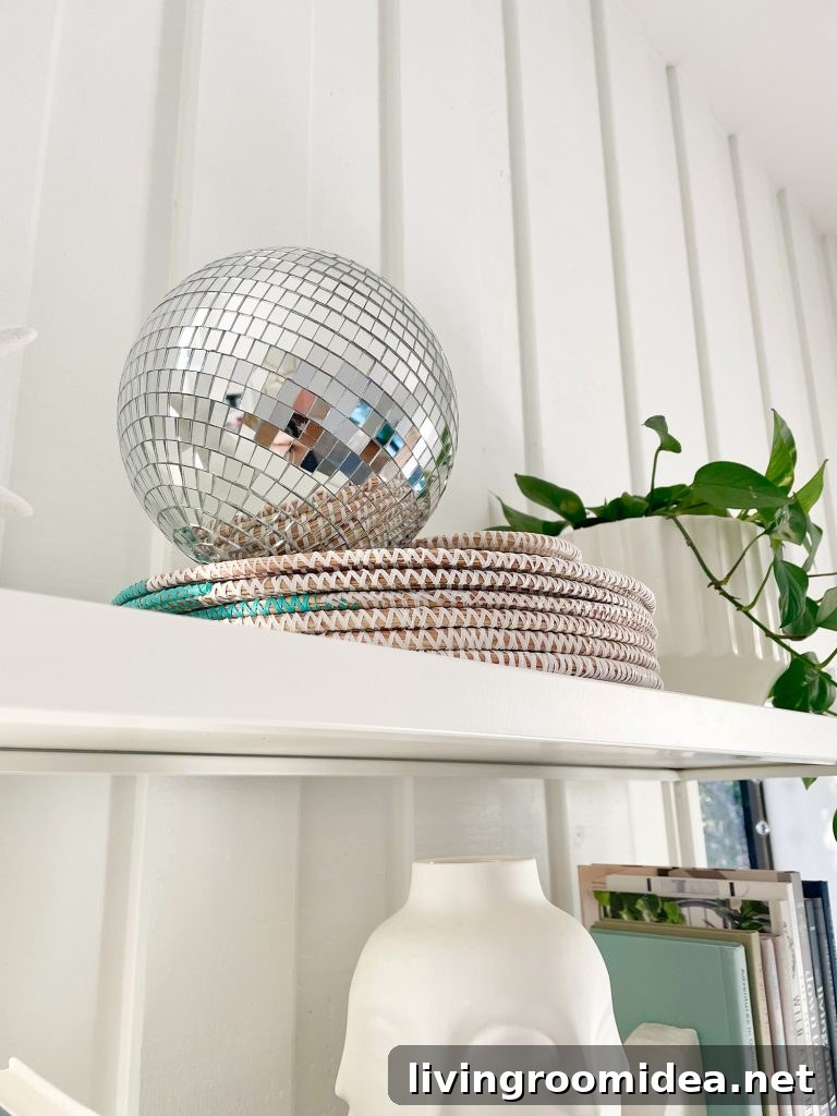 Decorative disco ball on top of shelves in office