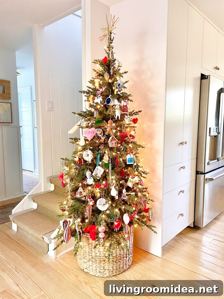 Narrow Christmas Tree in corner of kitchen next to pantry and stairs