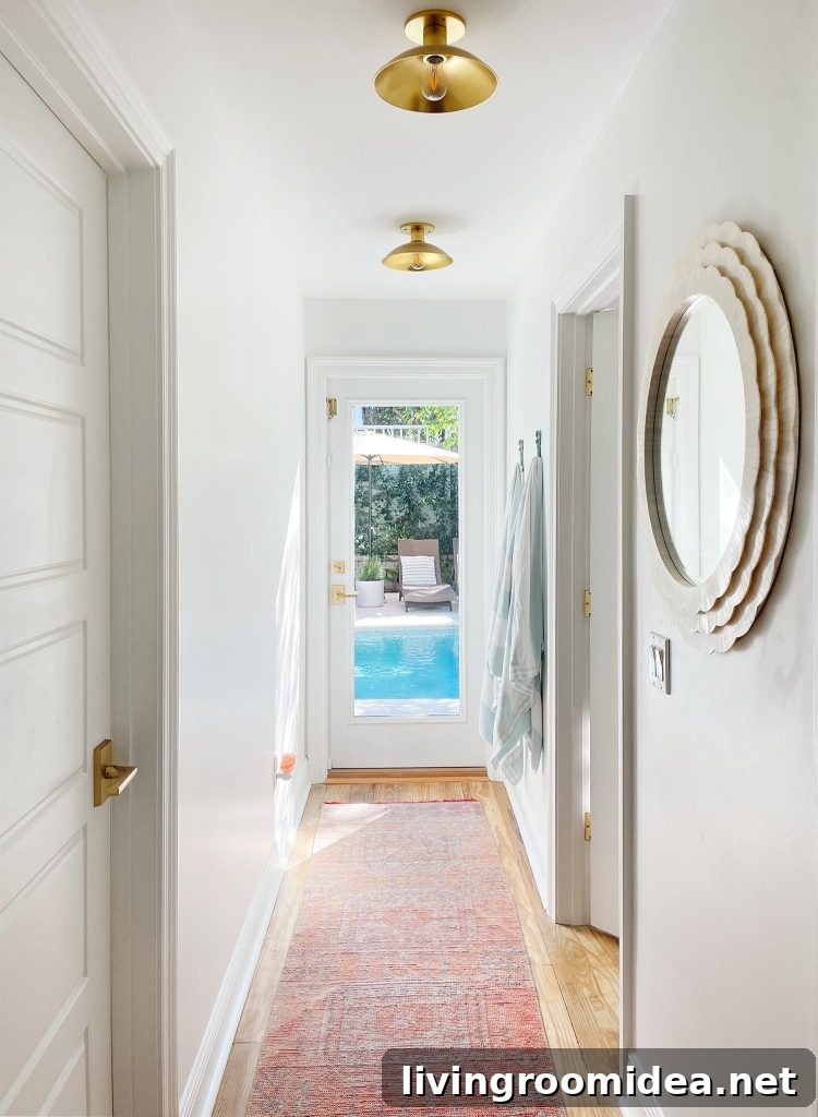 Hallway With Traditional Rug Leading To Pool