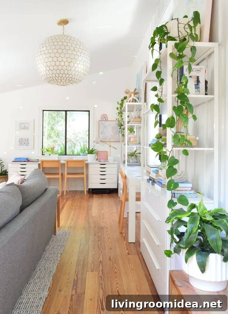 Upstairs family room with plants and Serena & Lily capiz pendant light