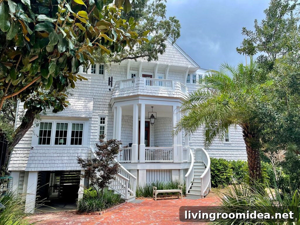 Large White Shingle House Among Trees