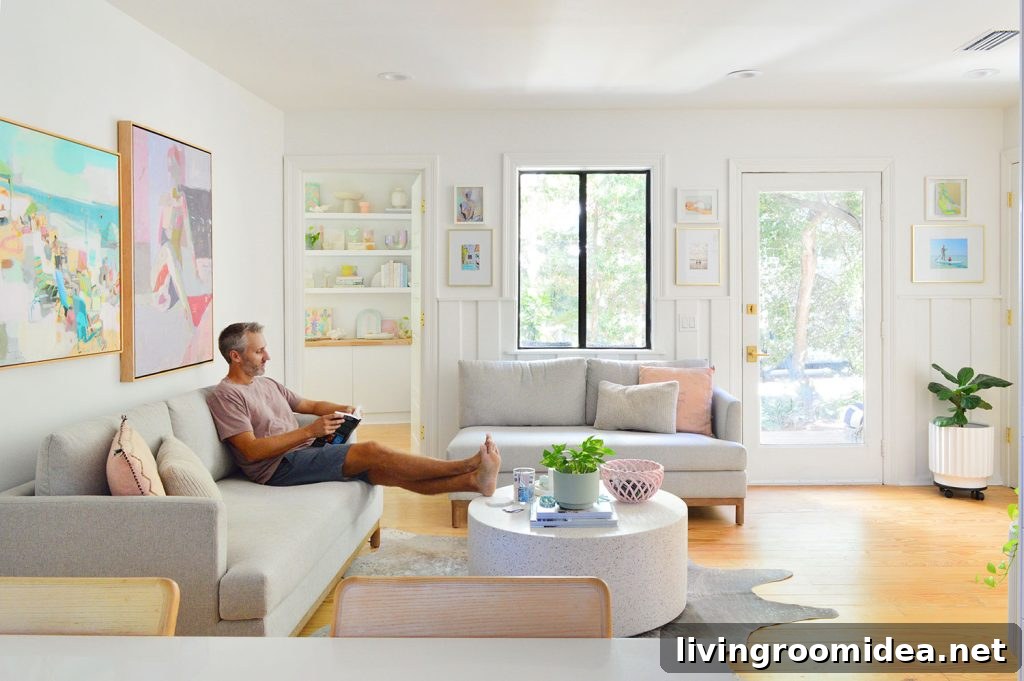 John Sitting In Kitchen Sitting Area With Two Loveseats