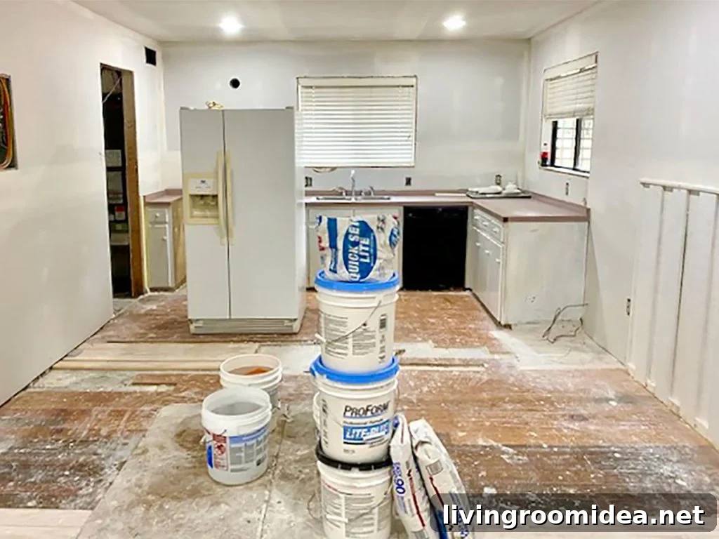 Renovating Our Home After Five Years Living Here 14 Kitchen Renovation With Dusty Floors And Refrigerator In The Middle Of The Room