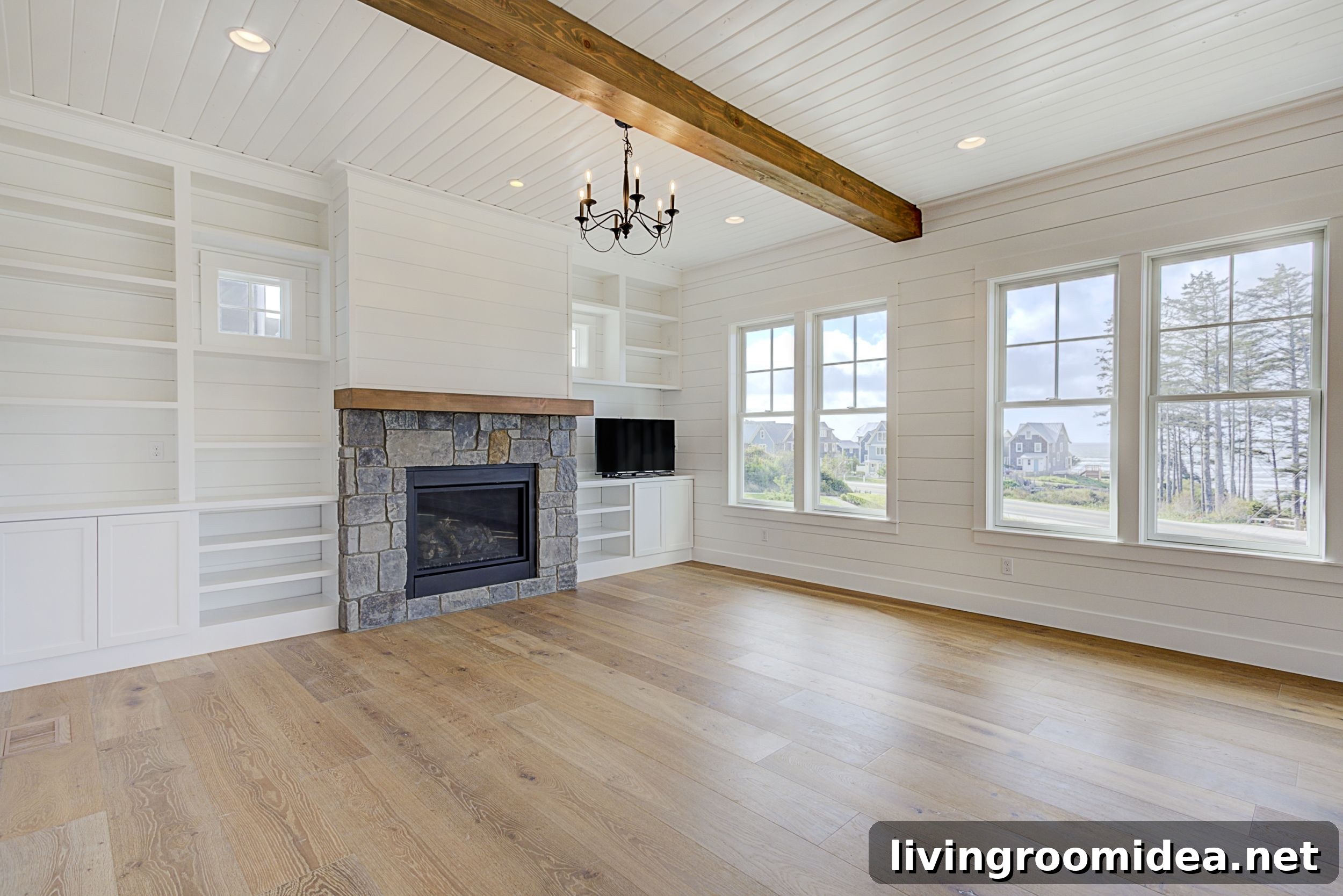 Inside a Dream Beach House in Seabrook: Coastal Home Tour 13 Stone fireplace white shiplap Beach House Tour