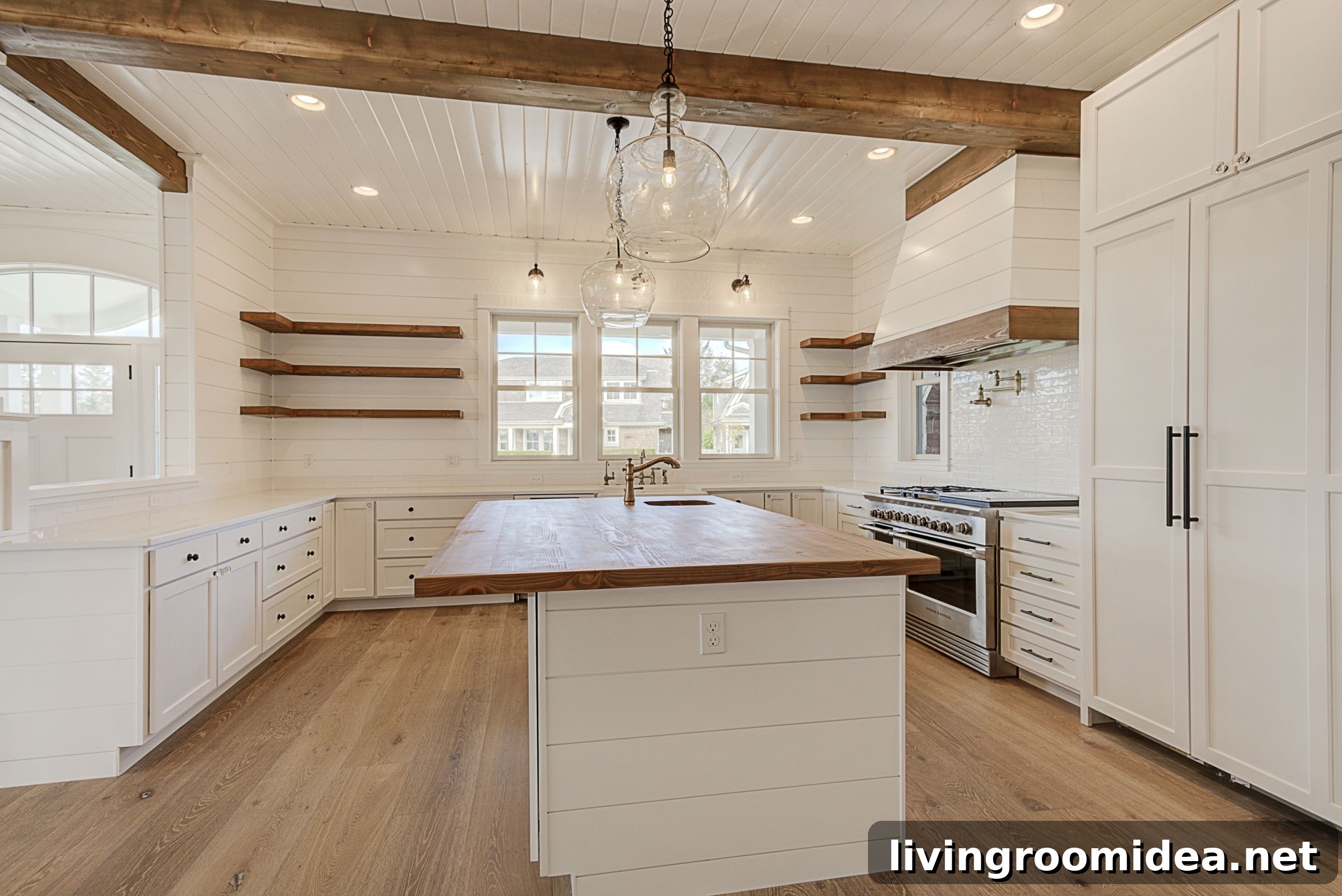 White shiplap modern coastal style kitchen - Beach House Tour