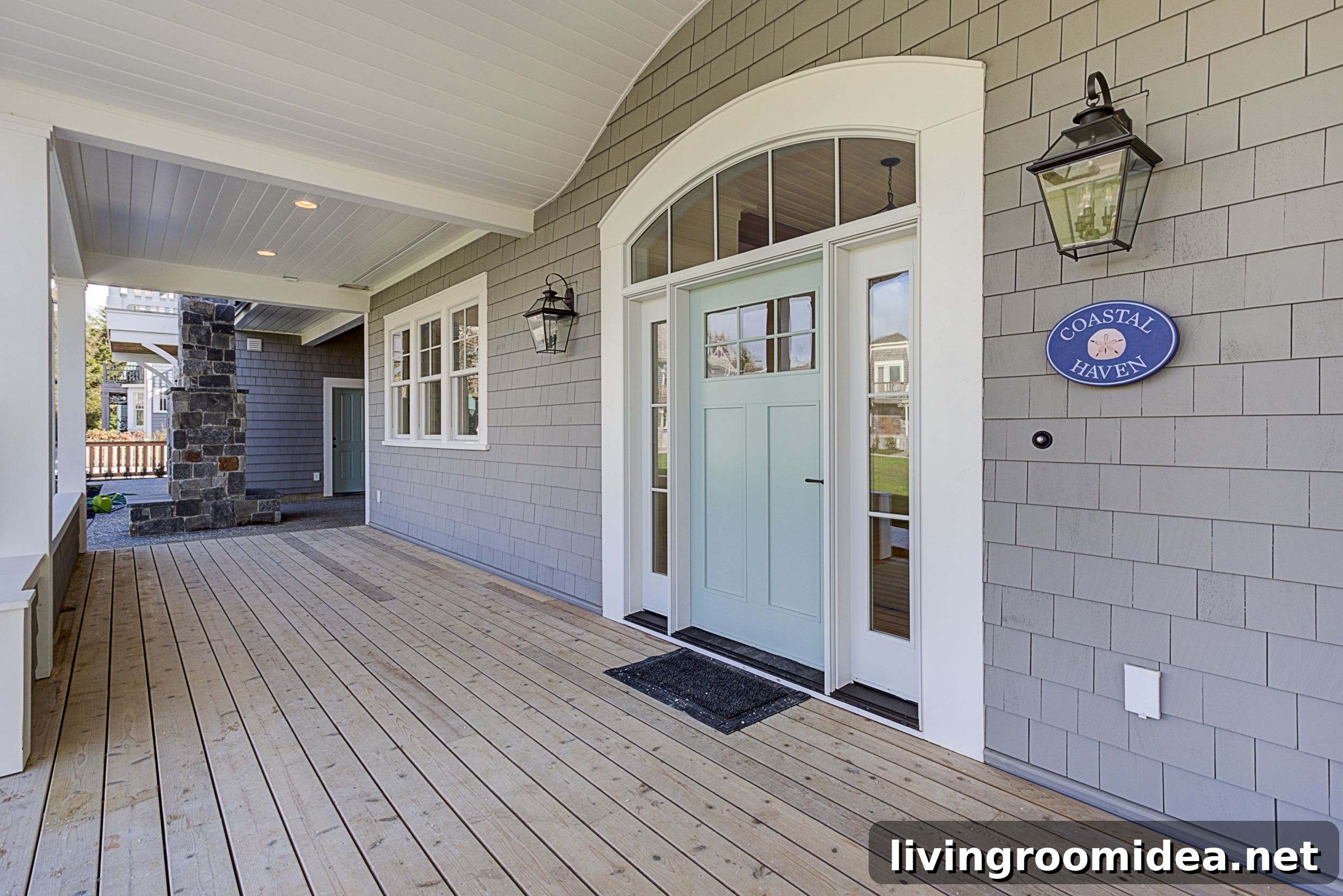 Arched front door shingled beach house