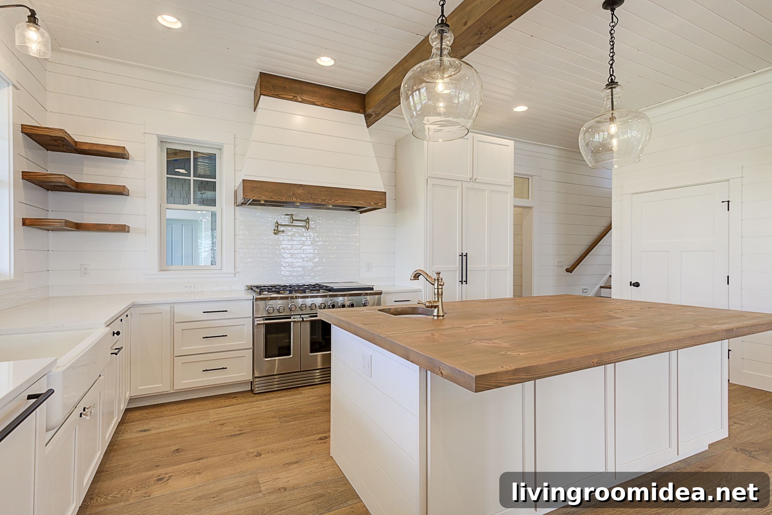 White and wood kitchen with black hardware - coastal farmhouse style kitchen with shiplap