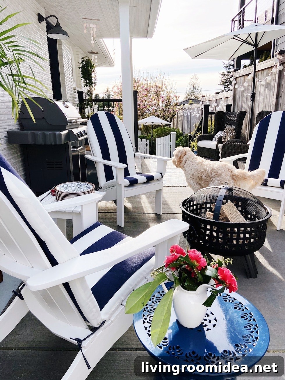 Deck and Patio Refresh: Top Outdoor Favorites for Summer 4 Striped cushions, white adirondack chairs around firepit