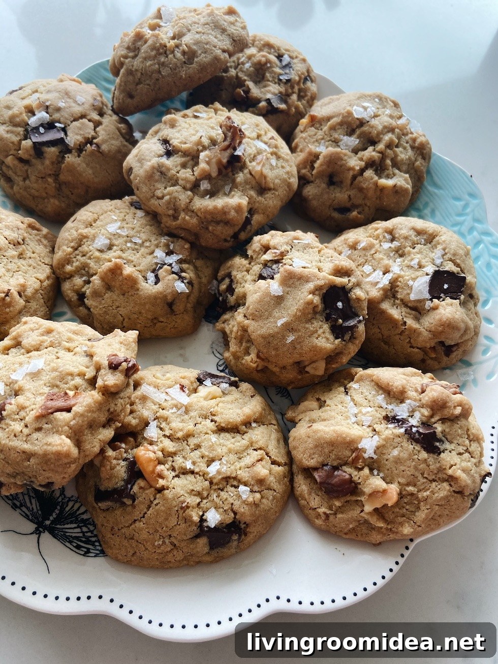 Gluten-Free Vegan Chocolate Chip Cookies with chopped walnuts and sea salt flakes