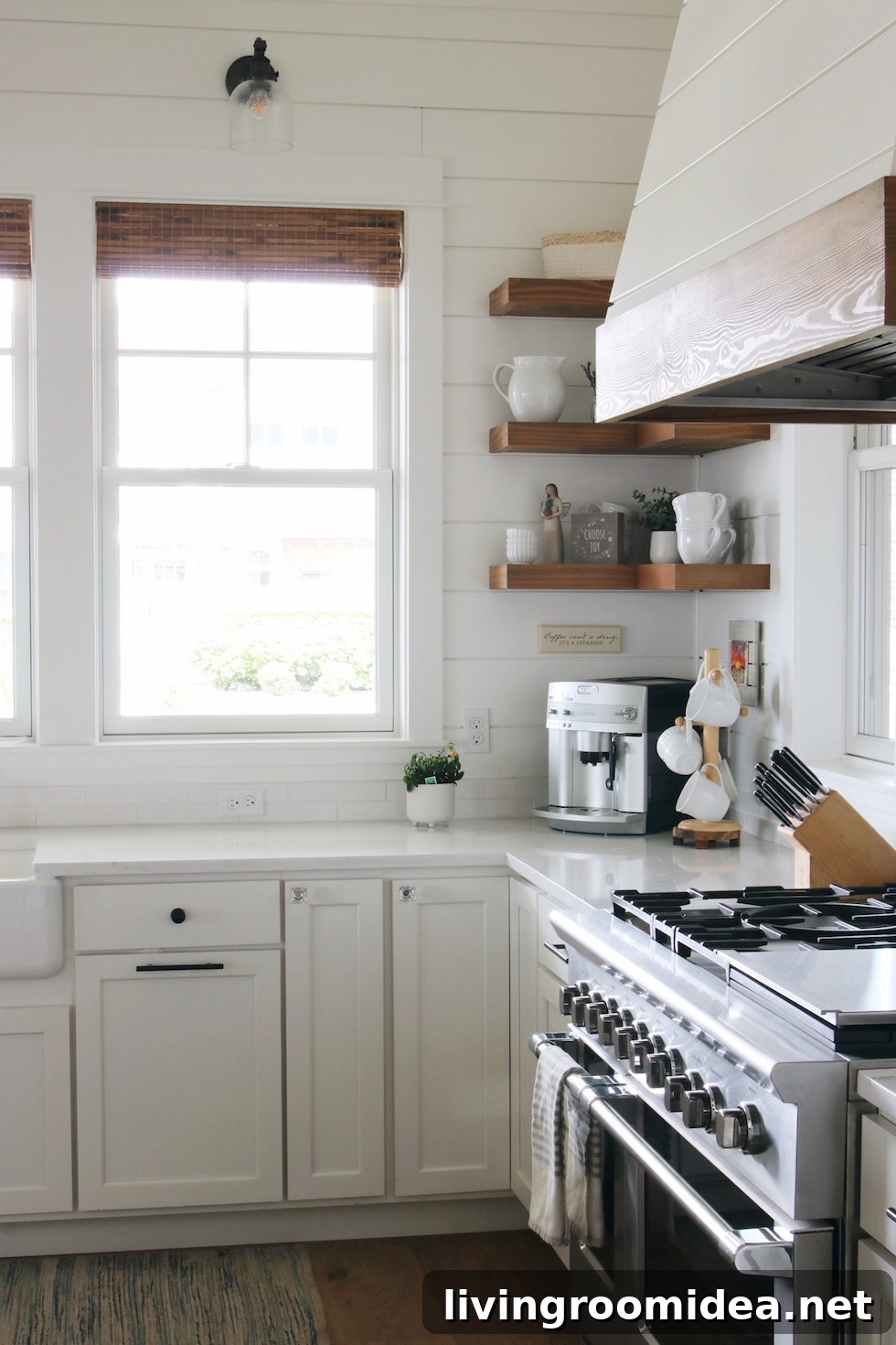 Shingle-Style Beach House Tour in Seabrook, WA 19 White kitchen shiplap corner wood shelves