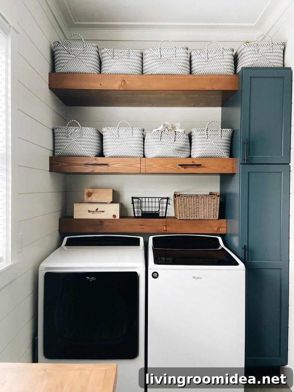 Shingle-Style Beach House Tour in Seabrook, WA 25 Wood shelves above washer and dryer (built in drying racks)