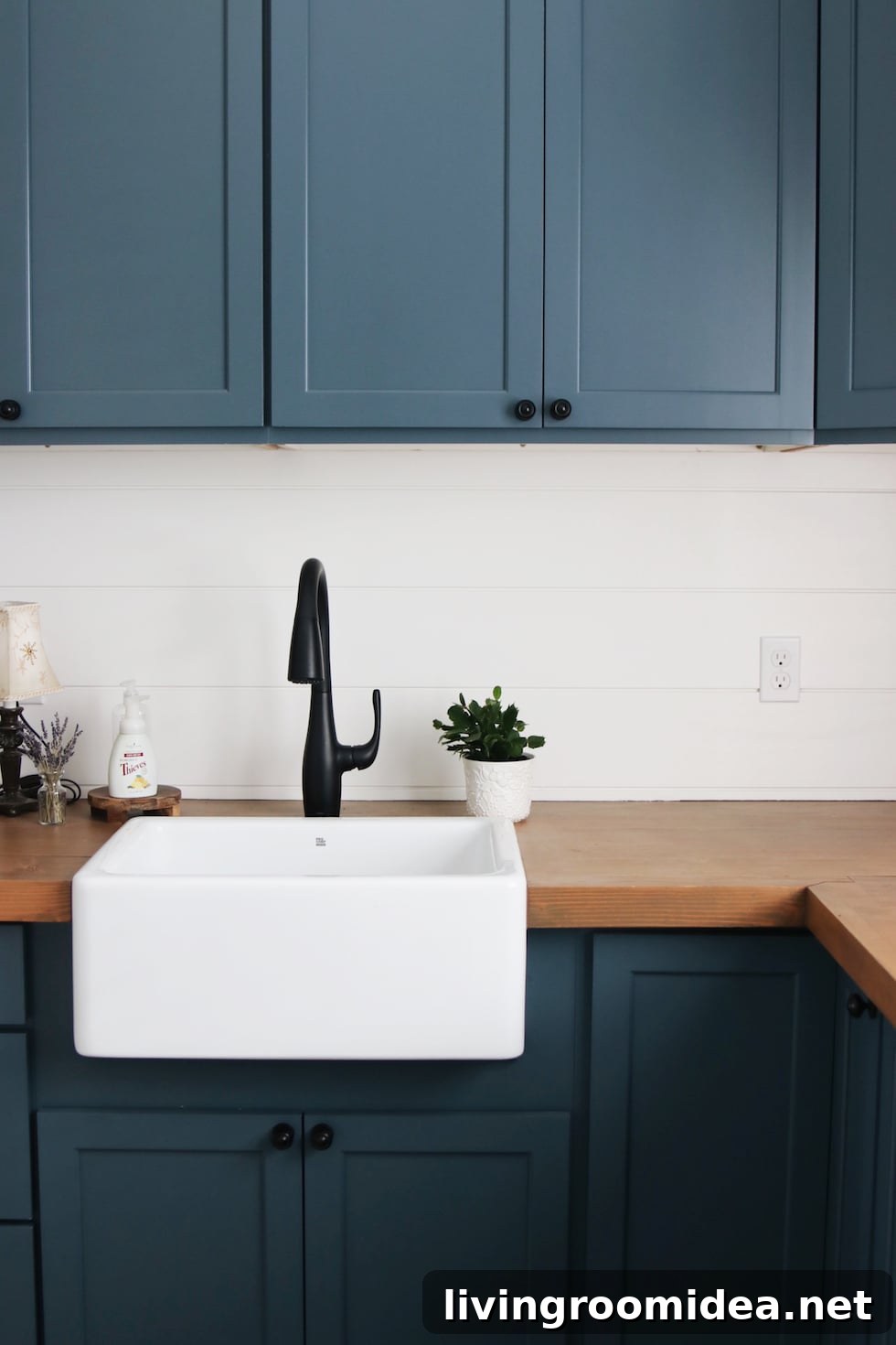 Shingle-Style Beach House Tour in Seabrook, WA 26 Laundry room sink