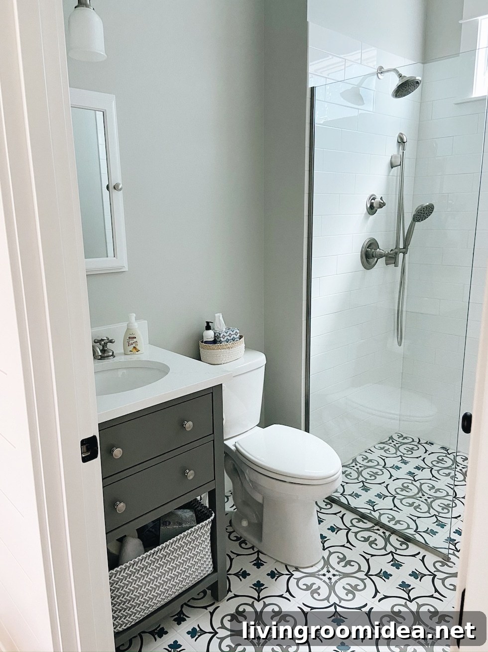Shingle-Style Beach House Tour in Seabrook, WA 33 Patterned tile guest bathroom