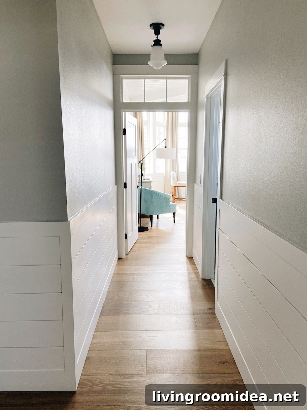Horizontal shiplap hallway with gray owl paint 