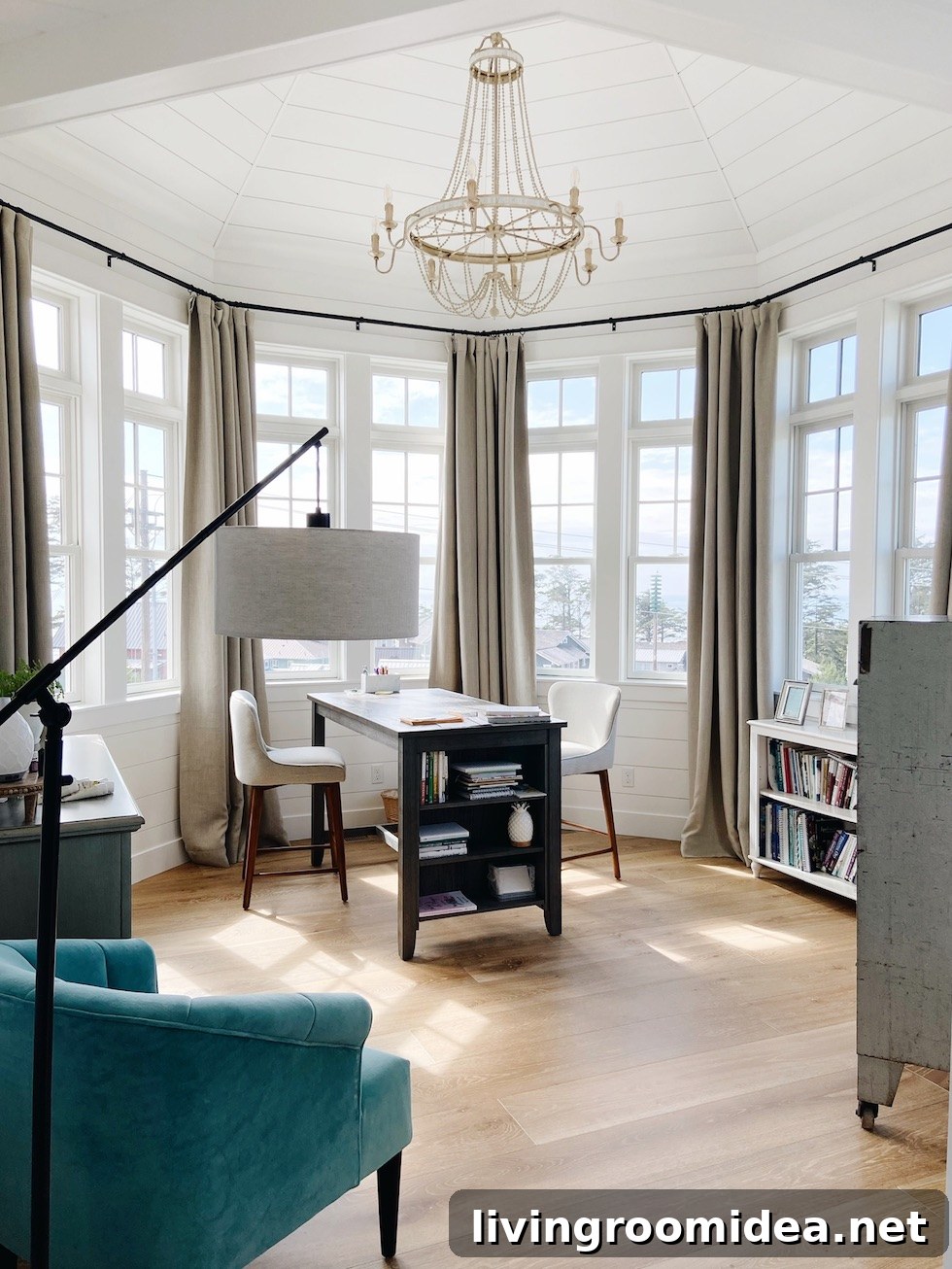 Turret home office with bay window in a coastal home, shiplap walls and ceiling