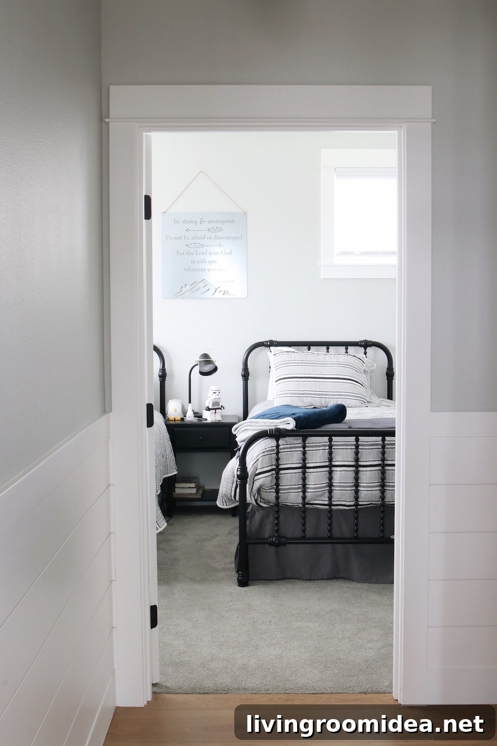 Coastal Dream Home Tour: Upper Levels Walkthrough 19 Children's room coastal dream house black spindle bed