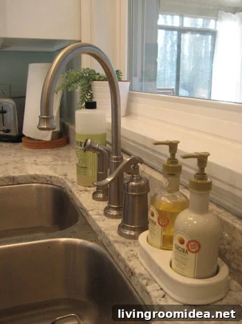 satin nickel arched kitchen faucet with sprayer and farmhouse pump style control