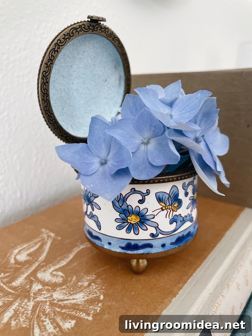 jewelry box repurposed as a small vase