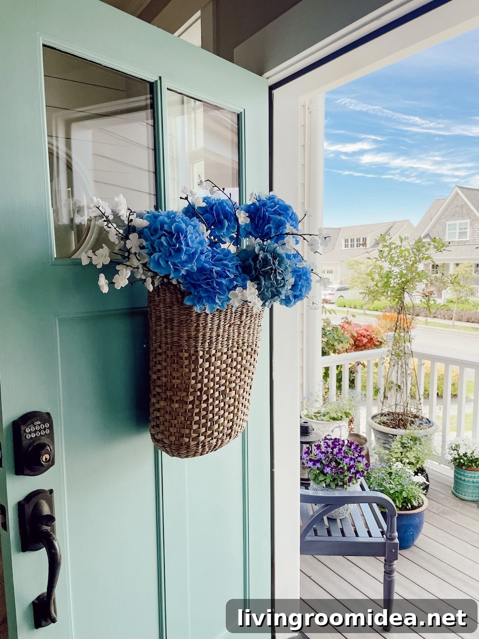 Faux hydrangeas in a summer door basket.