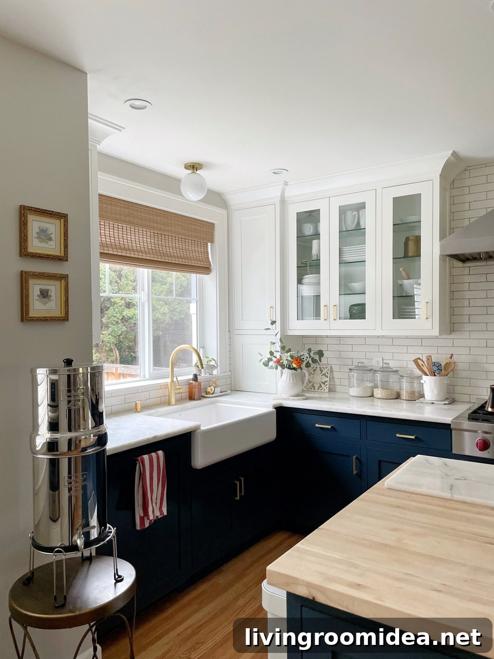 Navy and white cape cod style kitchen. It's the little things that make a house feel like home! 