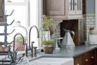 Old-World Modern Farmhouse Kitchen with Natural Wood Cabinets