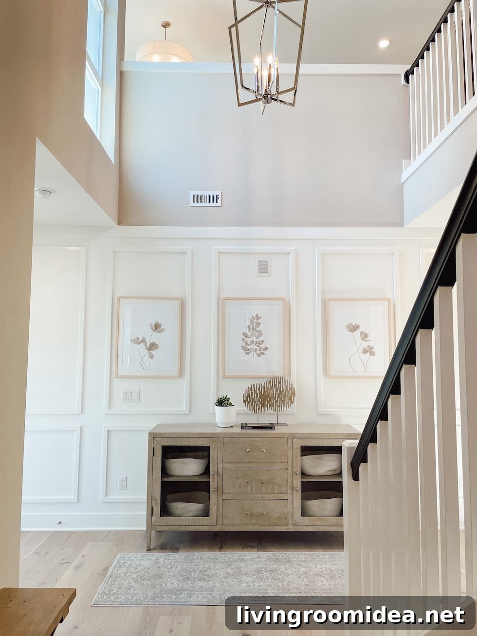 Gorgeous entry design with white oak flooring and wall paneling detail