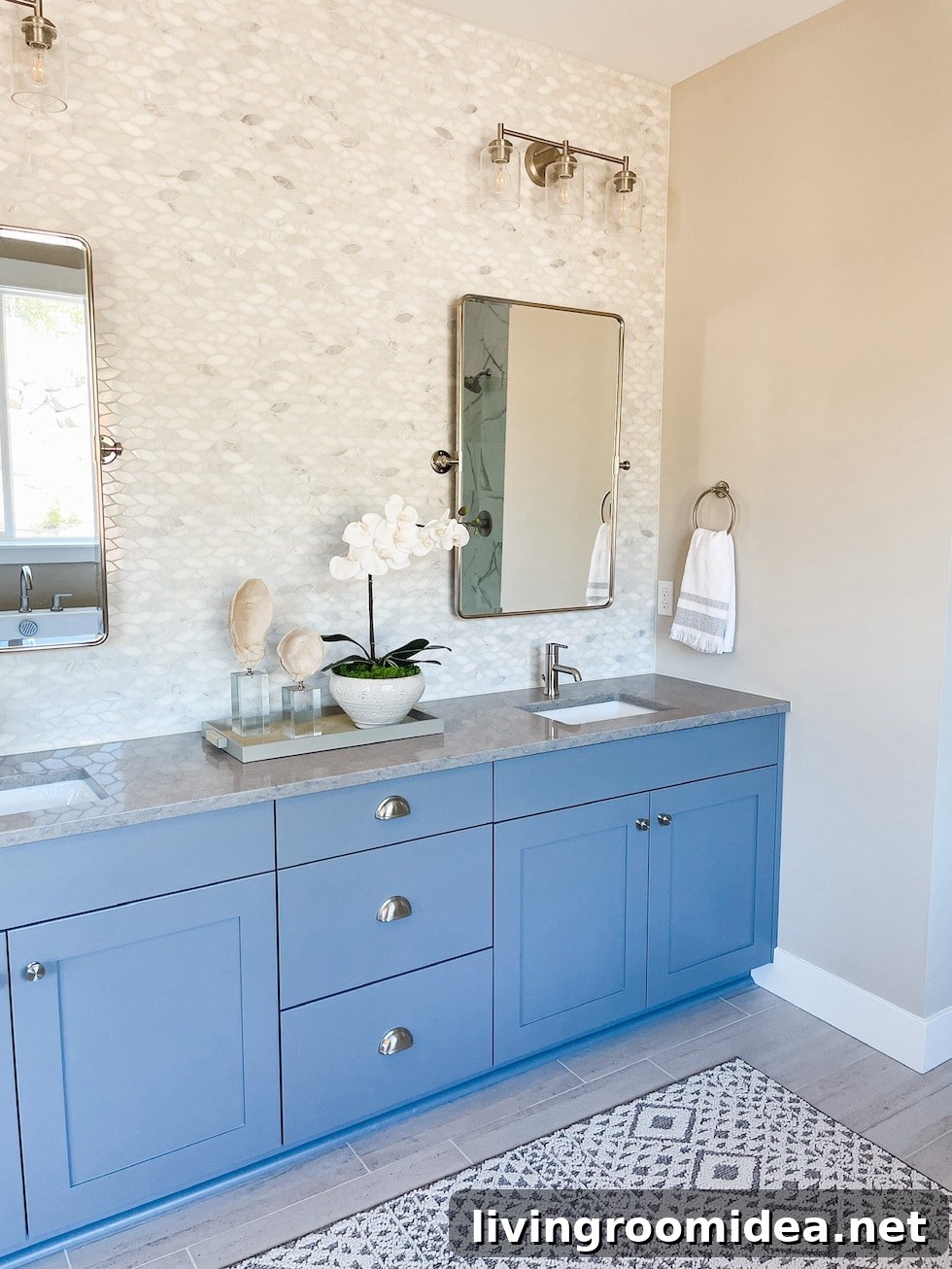 Beautiful primary bathroom suite with a full wall of tile