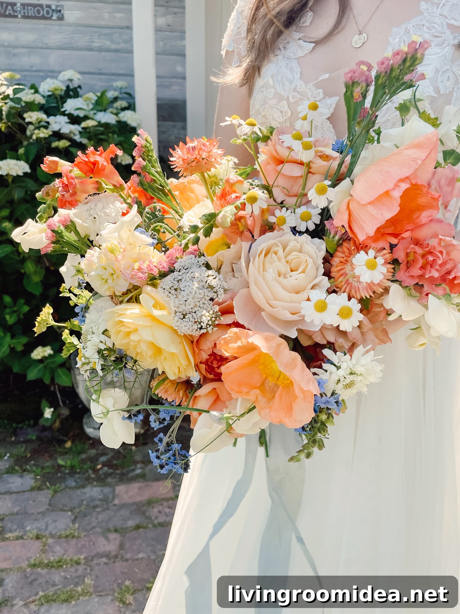 Gorgeous peach and pink floral bouquet (wedding planning advice and tips in the post)