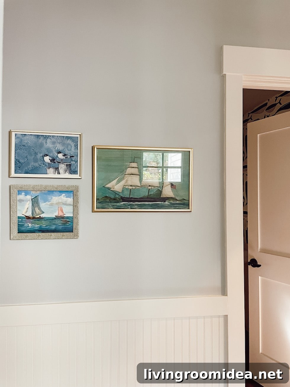 7 Simple Changes That Made Our House Feel Like Home in Year One 4 coastal paintings on a wall