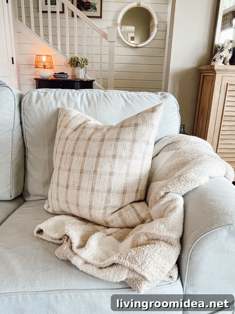 7 Simple Changes That Made Our House Feel Like Home in Year One 6 Cozy throw blankets and pillows