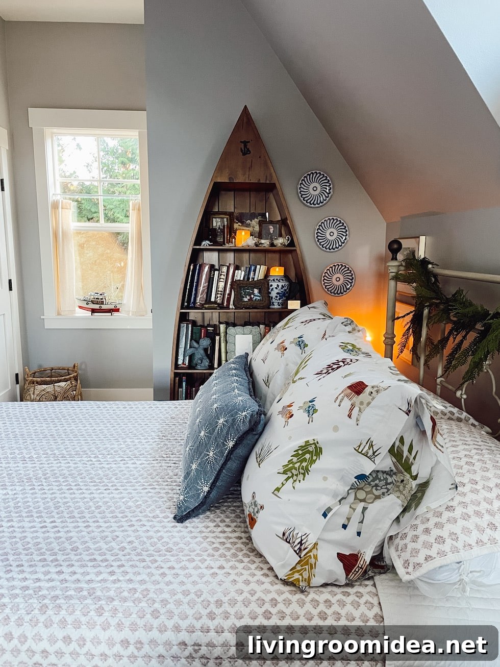Attic ceiling peaked ceiling room with a guest bed / Woodland animals pillow shams whimsical winter bedroom