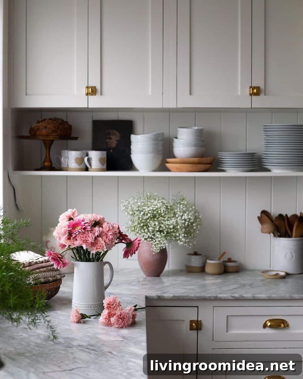 Enjoy today's pop of pink strolls & scrolls inspiration, this kitchen is so pretty with pink carnations!
