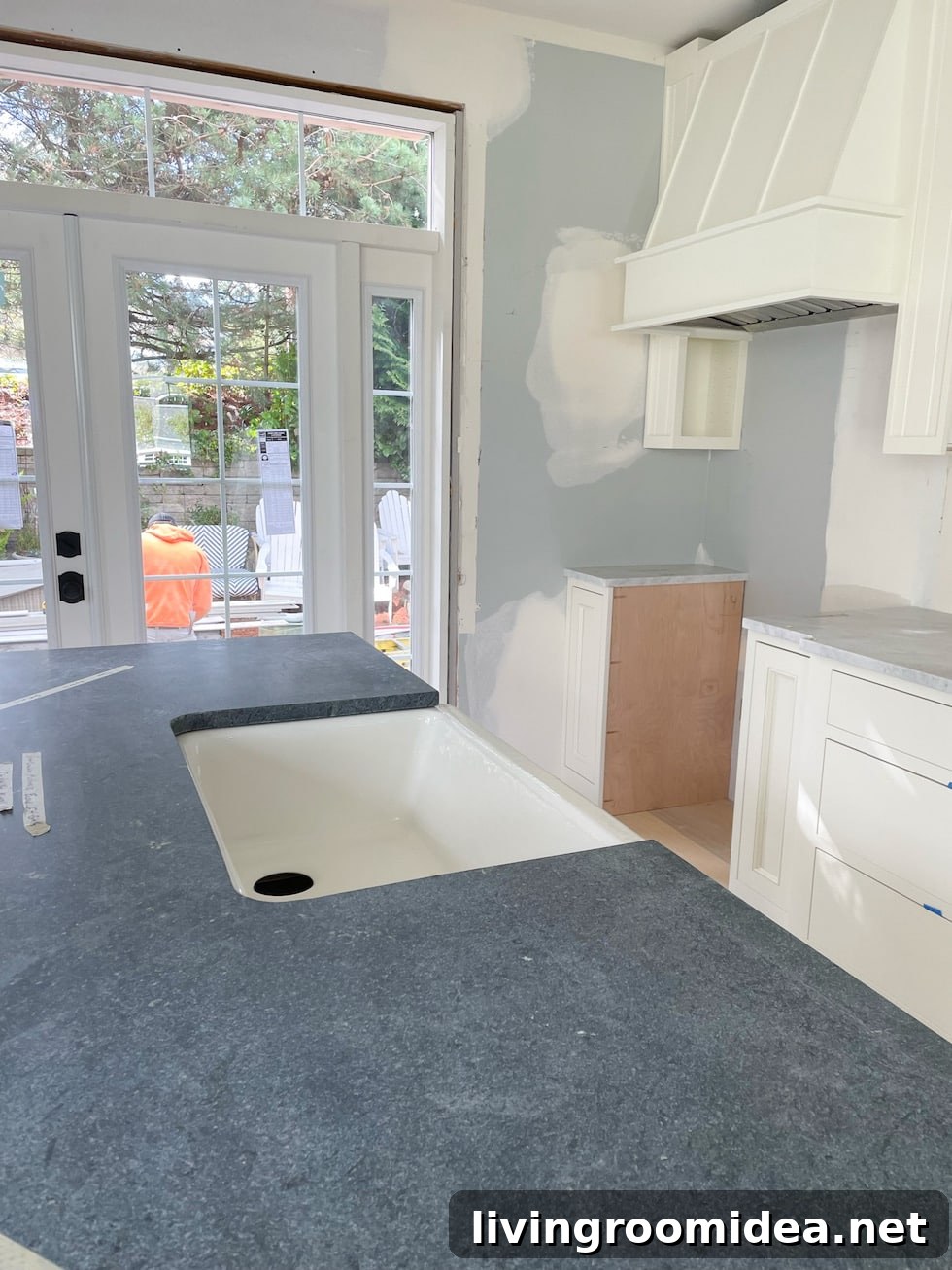 Kitchen renovation update with marble, soapstone, french doors and beadboard!