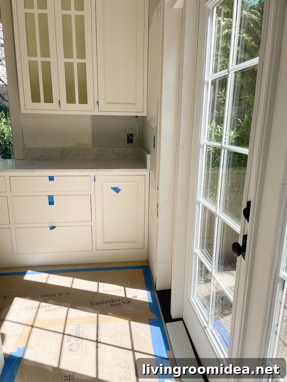 Kitchen renovation update with marble, soapstone, french doors and beadboard!