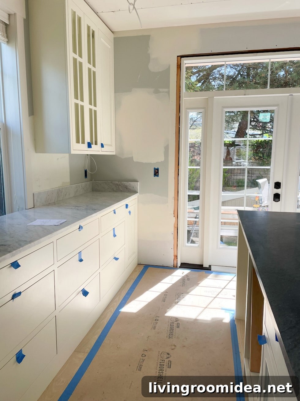 Kitchen Renovation: Marble Counters, Soapstone, French Doors & Beadboard 5 Kitchen renovation update with marble, soapstone, french doors and beadboard!