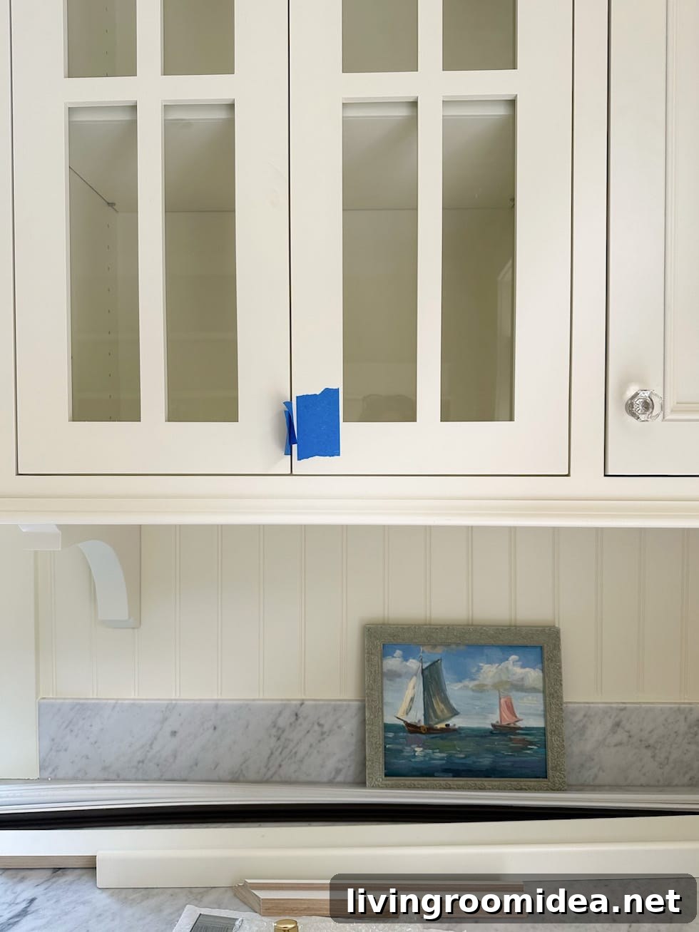 Beach House Kitchen Remodel Progress and Tiny Cottage Tour 3 Testing out colors with art in our beach house kitchen remodel