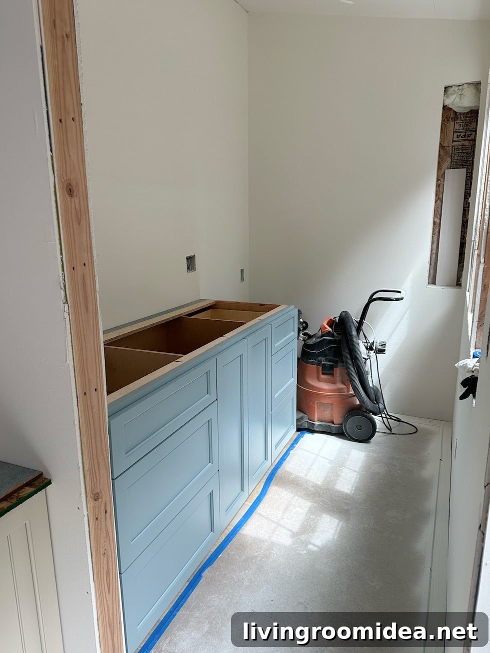 Tiny cottage sherwin williams lanquid blue cabinets 