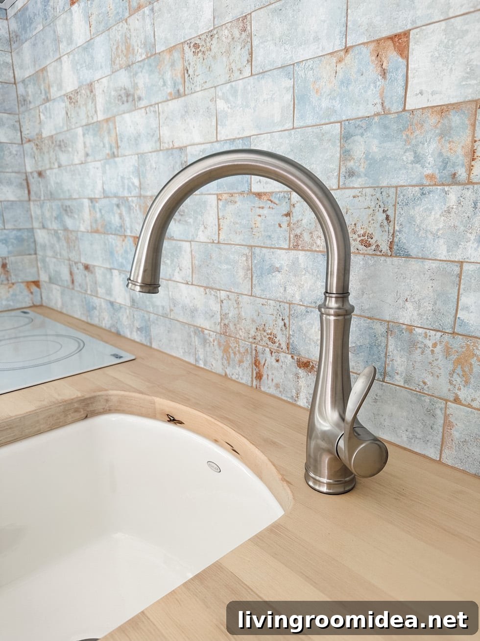 Tiny Cottage tour kitchen faucet and bar sink