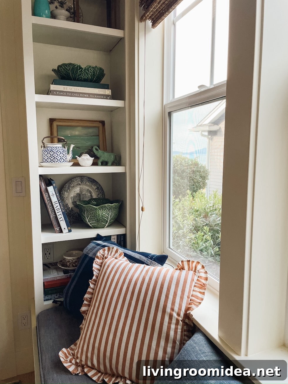 Dining Nook Banquette Update: How We Chose Our Table and Chairs 3 Built in dining nook banquette with bookcases