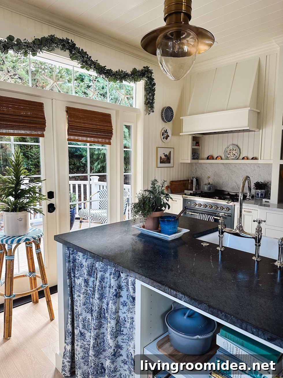 Toile skirt on kitchen island, soapstone counters  in an English cottage inspired kitchen at Christmas